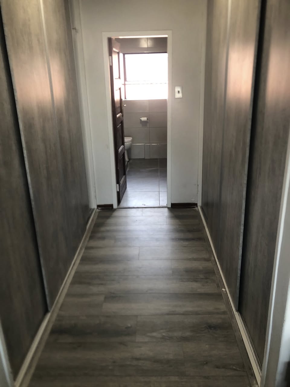 Hallway with new wood-look flooring